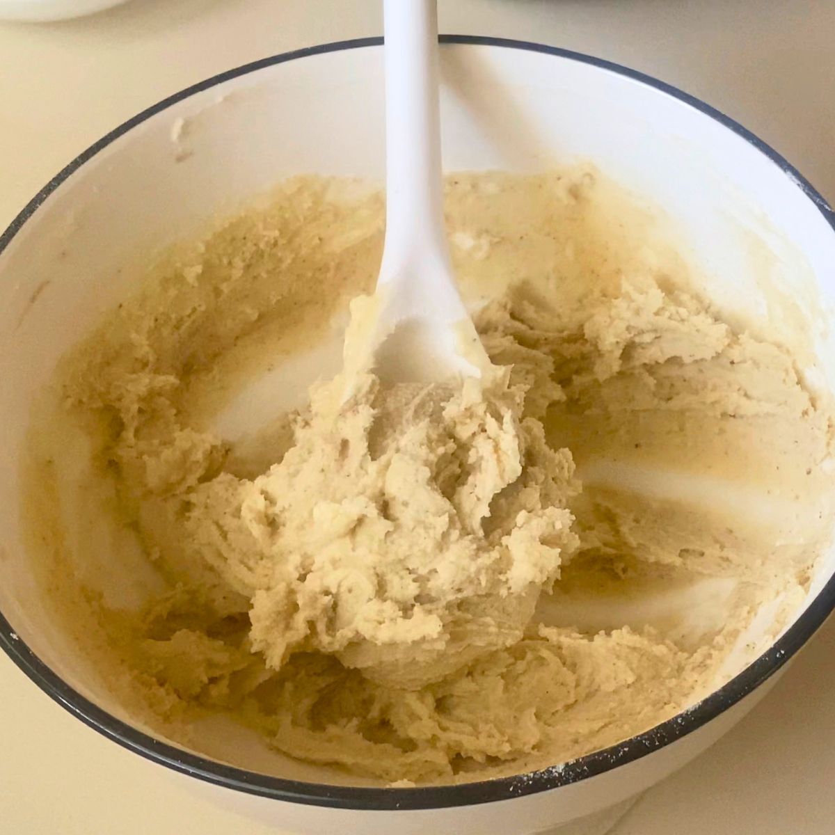 Butter cookie dough in a bowl for chilling