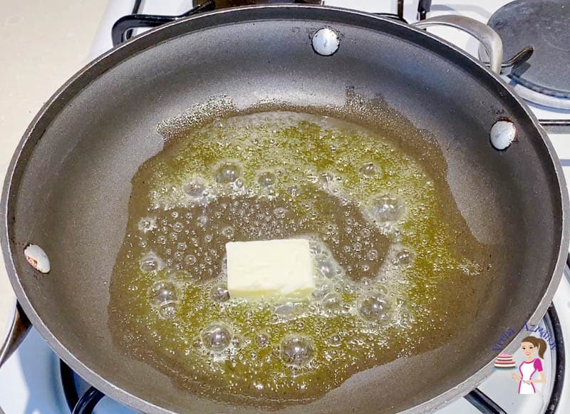 Heat a skillet with oil and butter