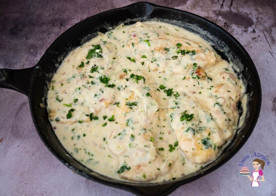 A pan of chicken in a white sauce.