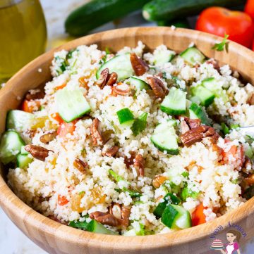 A bowl of couscous and salad.