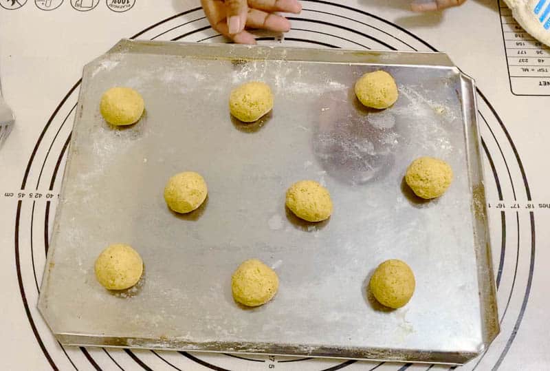Roll cookie dough into balls