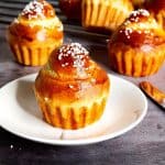A brioche a tete on a plate.
