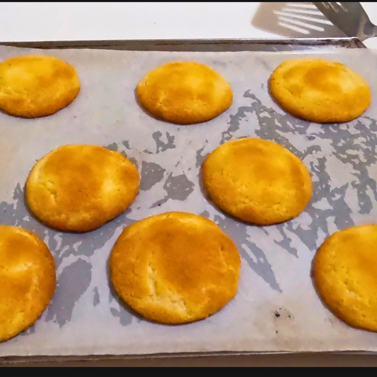 A Baking Tray with sweetened condensed milk cookies.