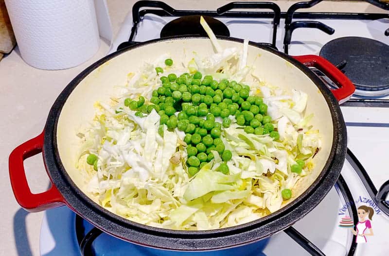 Add cabbage and peas along with the turmeric
