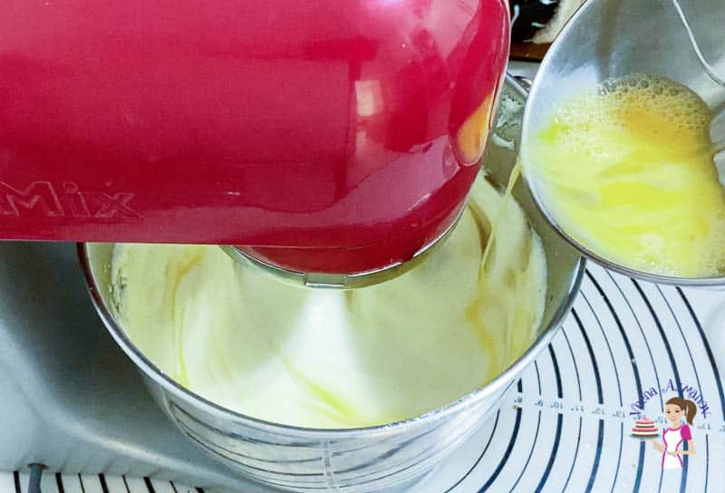 Add the beaten eggs to the cheesecake mixture