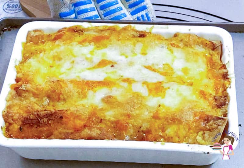 Bake the enchiladas for 20 minutes until golden and bubbling.