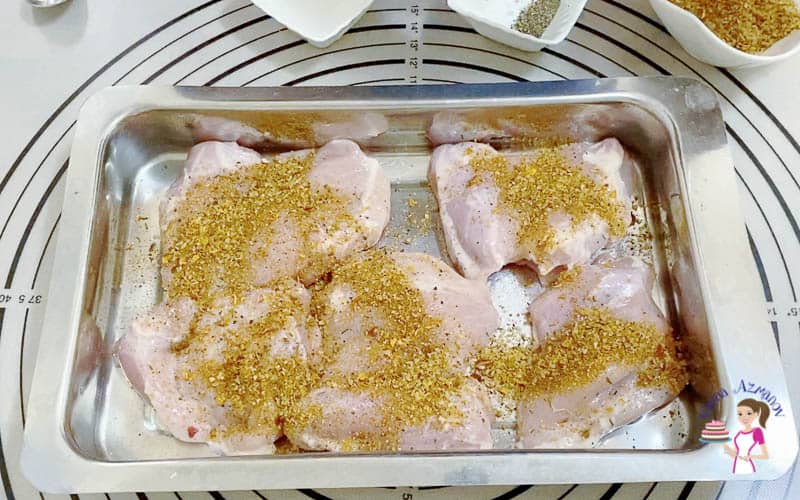 coat the chicken generously with cajun spice