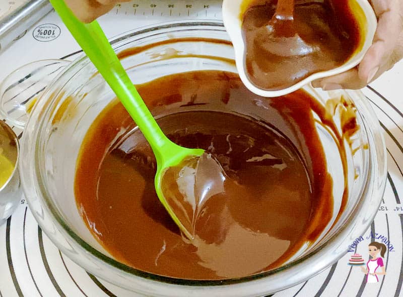 Add caramel sauce to the melted butter and chocolate