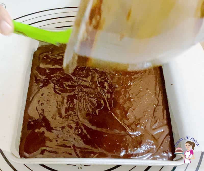 Pour the brownie batter into the baking pan