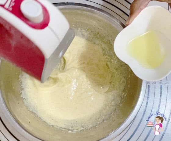 Add the oil to the whipped egg and sugar mixture