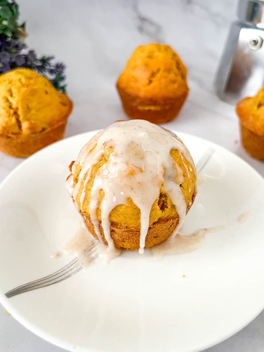 A plate with carrot muffin and sugar glaze.