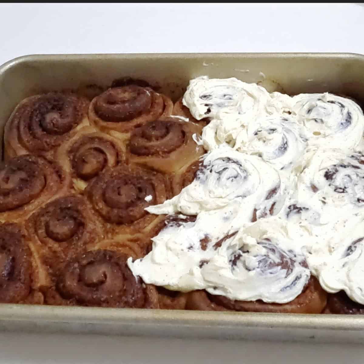 A rectangle pan with cinnamon rolls.