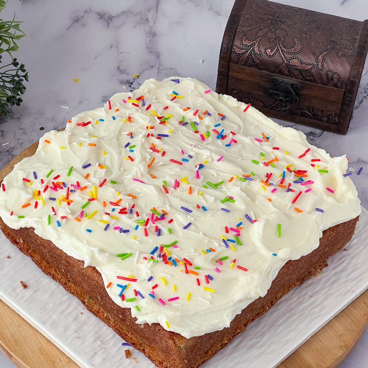 Funfetti sheetcake frosted with cream cheese frosting.