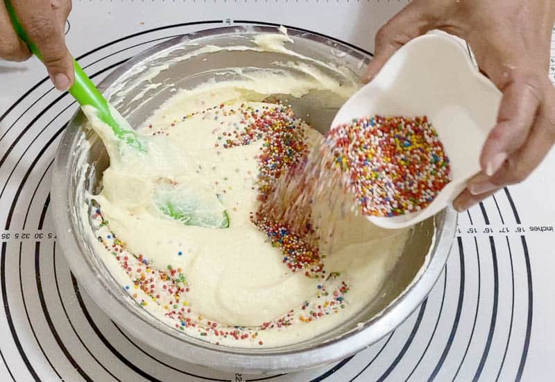 Add the sprinkles to the cake batter