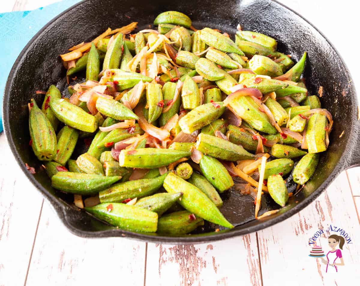 A skillet filled with okra.
