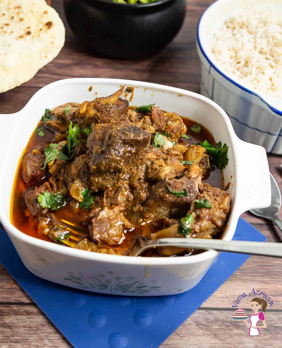 Slow cooked lamb curry in a serving bowl.
