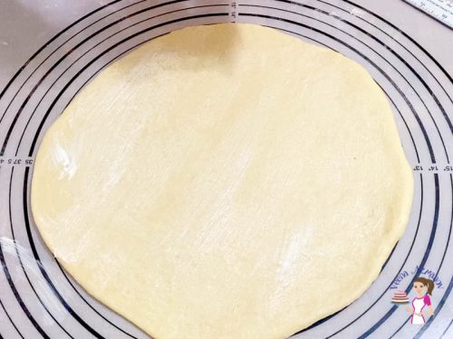 Roll the crescent dough into a 12-inch disc