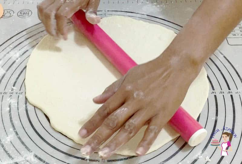 Roll the pizza dough to about 12 inches in round