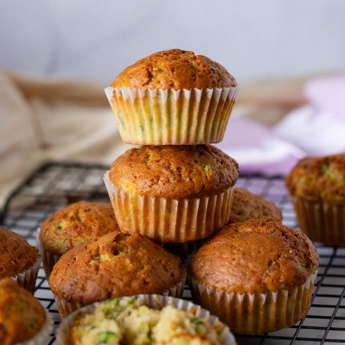 Muffins are stacked on the table.