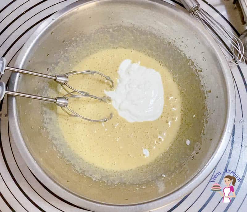 Add the sour cream to the muffin batter