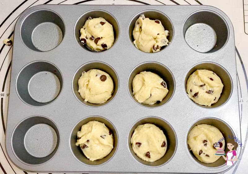 Divide the muffin batter between the 12 muffins