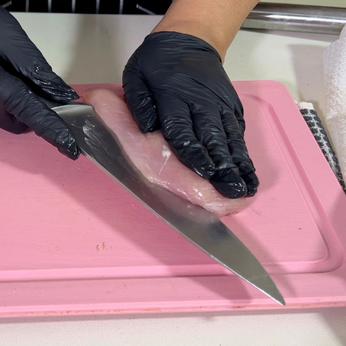 Cut the chicken breast in half horizontally.