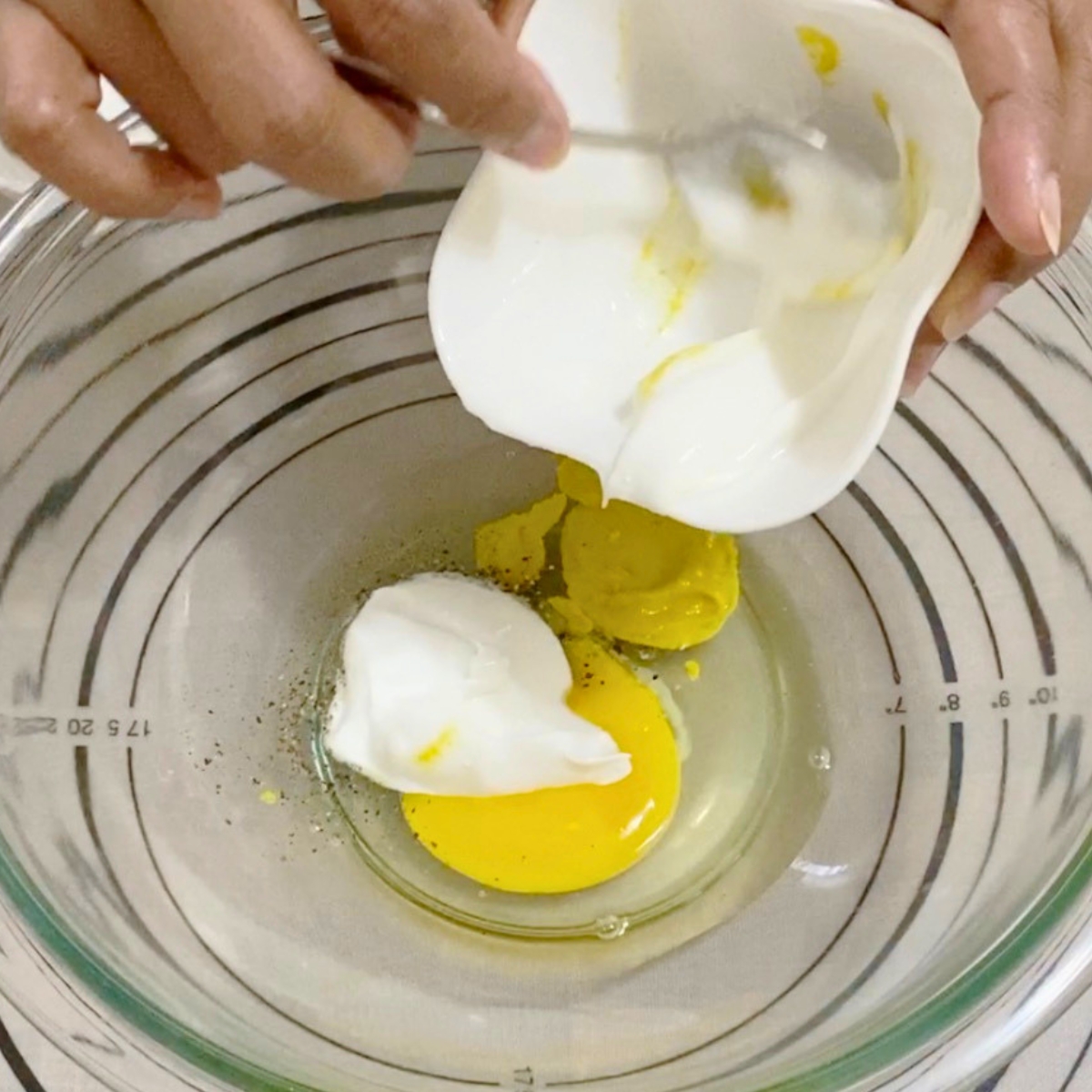 Yogurt marinade for breaded chicken breast.