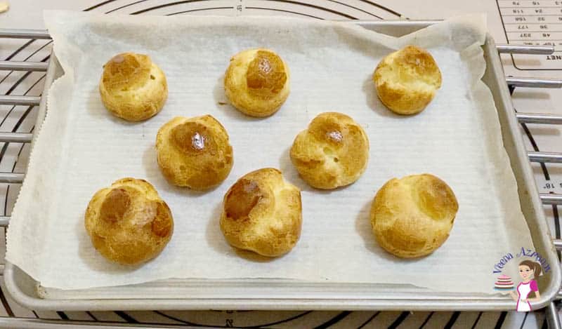 A tray of cream puffs.