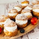 Cream puffs with cream cheese on the table.