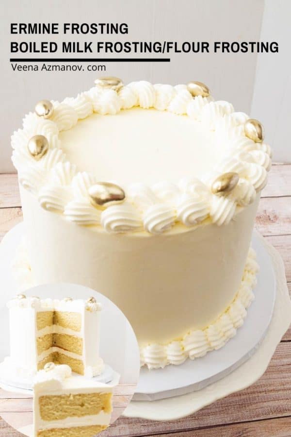 A white wedding cake on a cake stand.