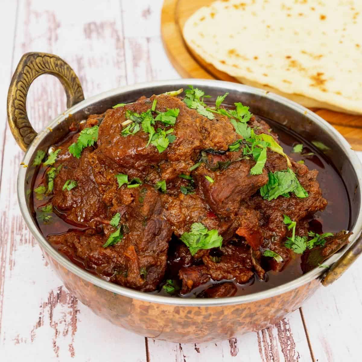 Indian lamb curry in a pot.