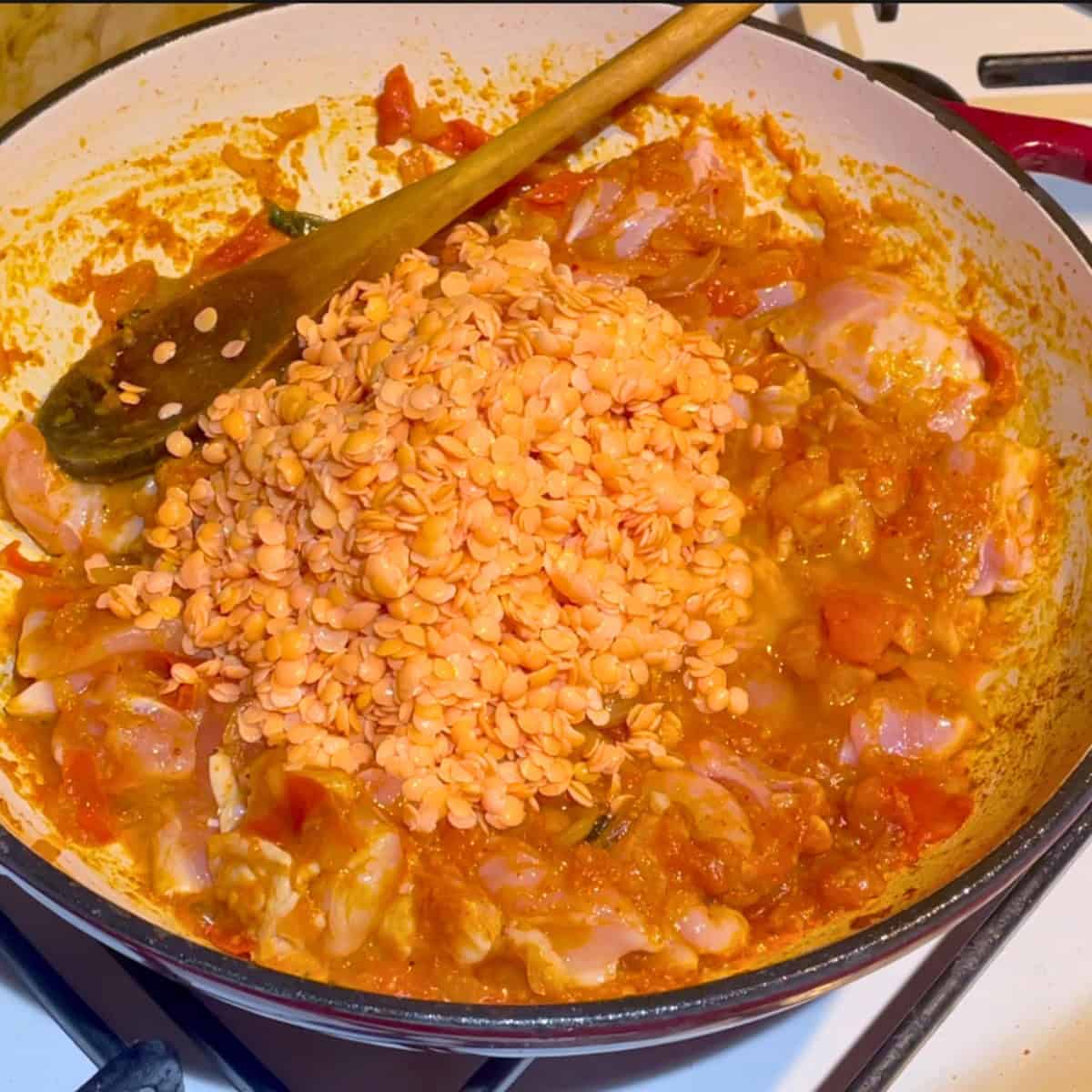 A skillet with lentils for curry.