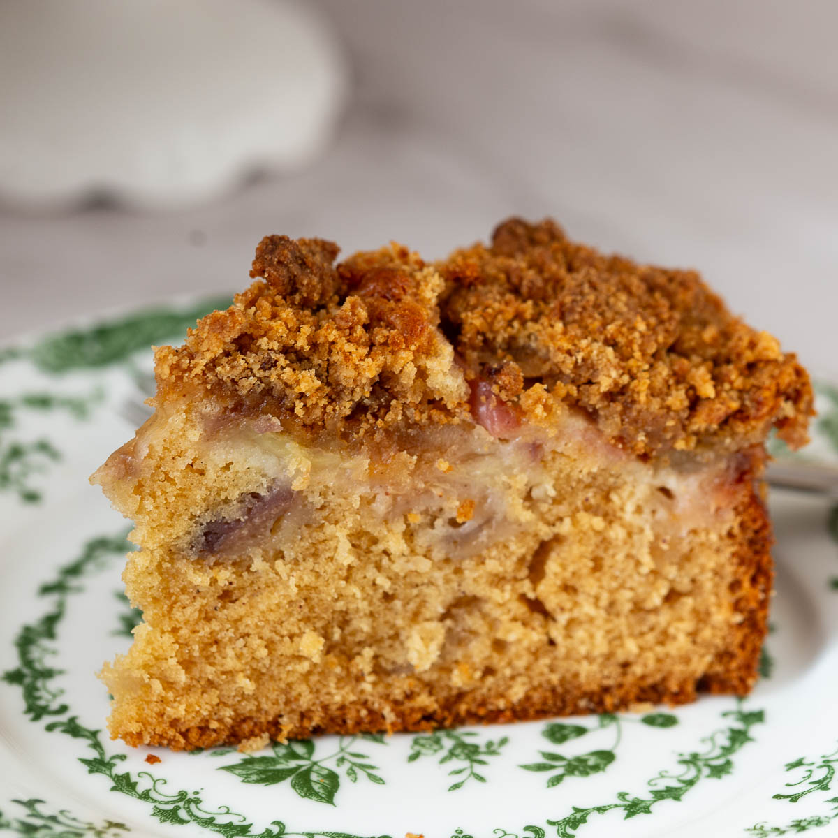 A slice of cake on the plate.