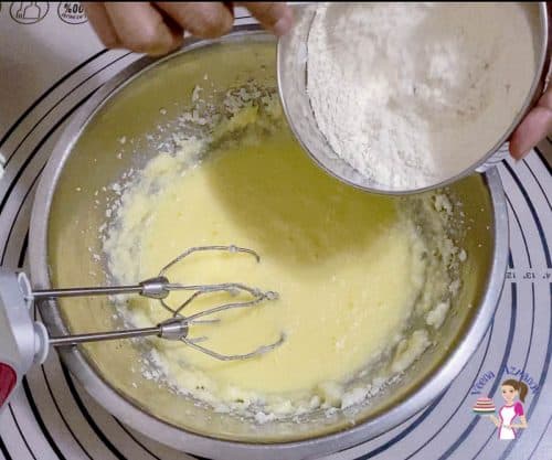 Add flour to the cake batter