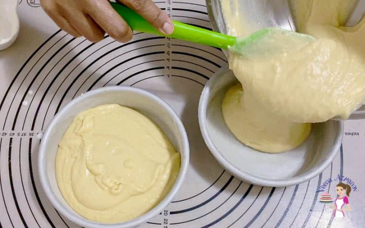 Divide the cake batter between two cake pans