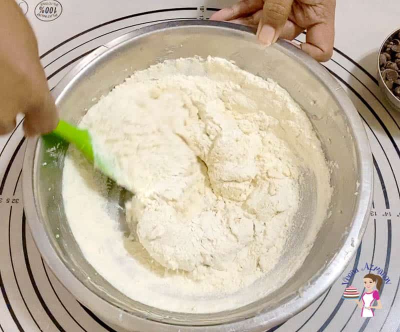 Add flour to the cookie dough