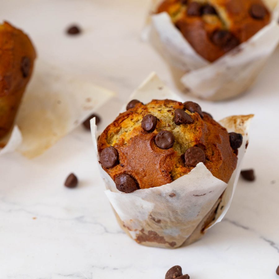 Banana Muffins on the table with chocolate chips.
