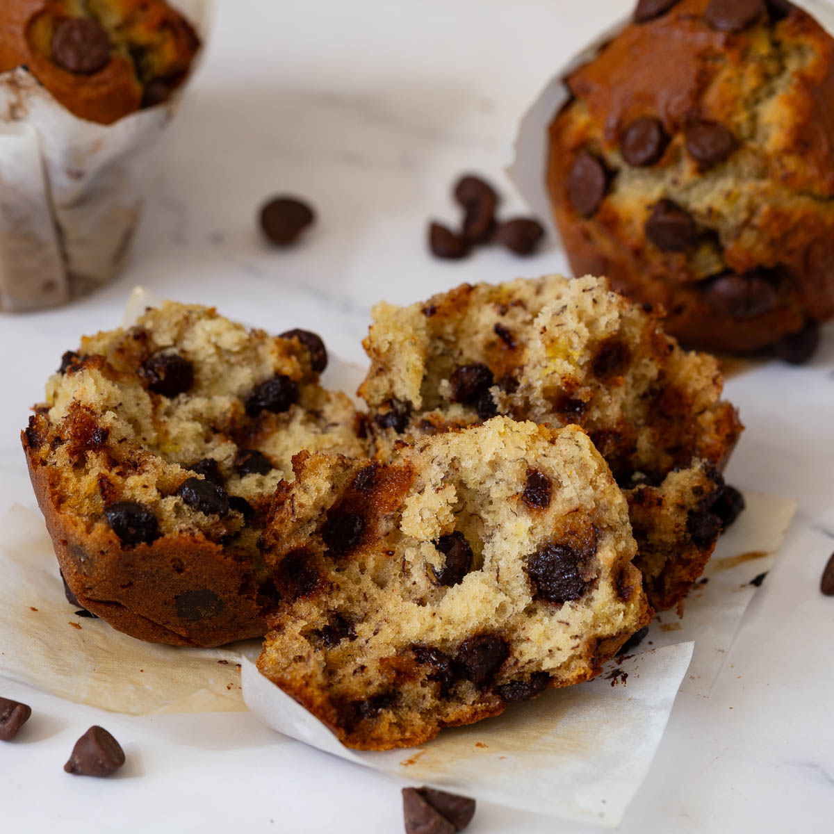 Baked chocolate chip muffins on the table.