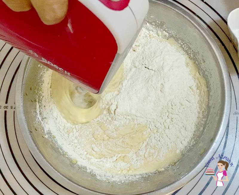 Add the flour to the muffin batter