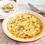 A crustless mushroom quiche in a pan.