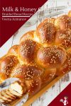 challah bread on a wooden board.