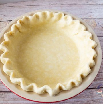 unbaked pie crust in a pie pan.
