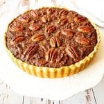 A pie on a cake stand.
