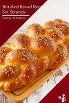 Challah bread on a wooden board.