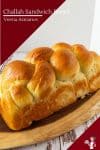challah bread on a wooden tray