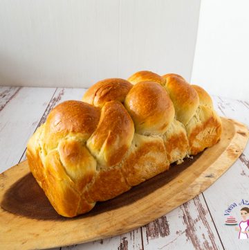 Challah bread on a wooden tray