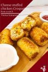 chicken croquettes on a wooden board.
