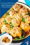 A skillet with beef casserole with biscuits on top