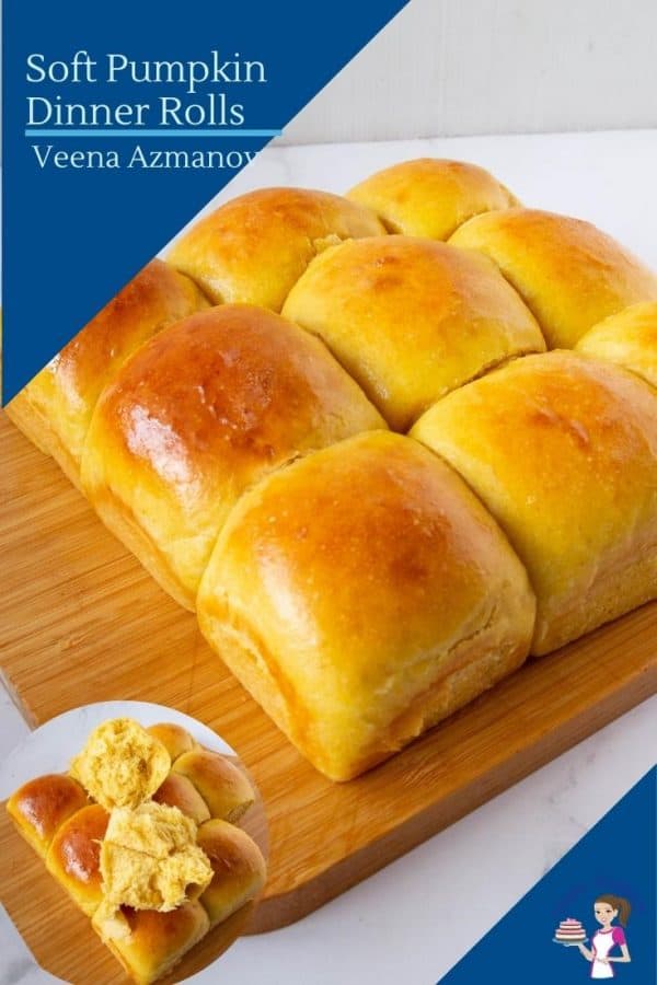 soft bread rolls on top of a wooden table