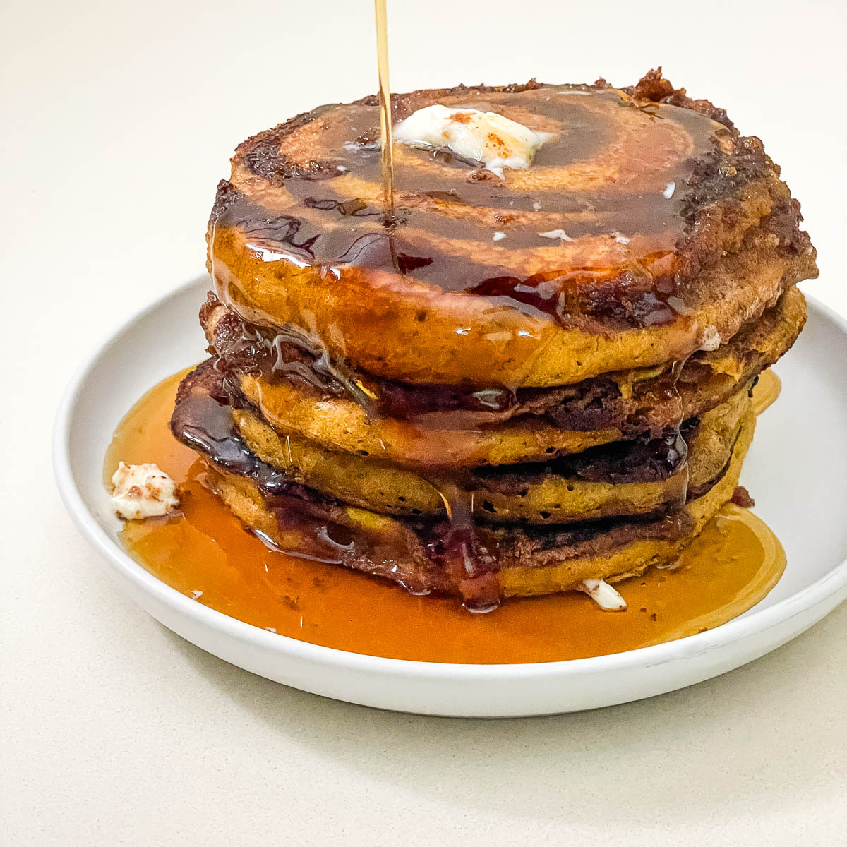 Stack of cinnamon swirl pumpkin cakes.